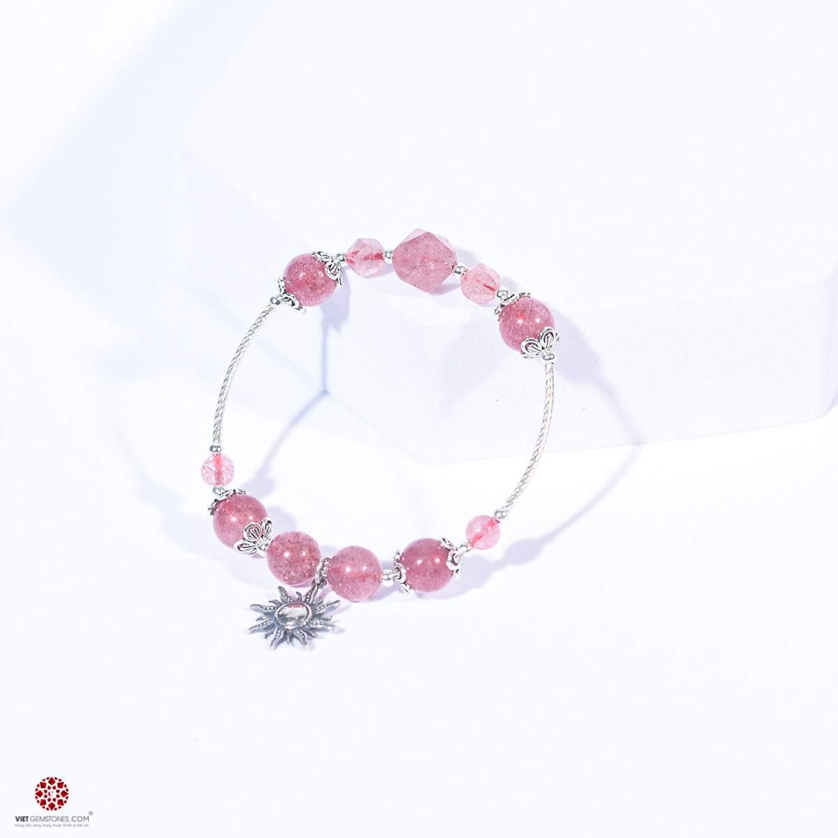 Lắc tay đá thạch anh dâu phối charm...