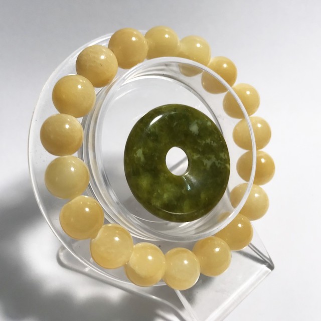 Vòng tay chuỗi hạt ngọc màu vàng cam