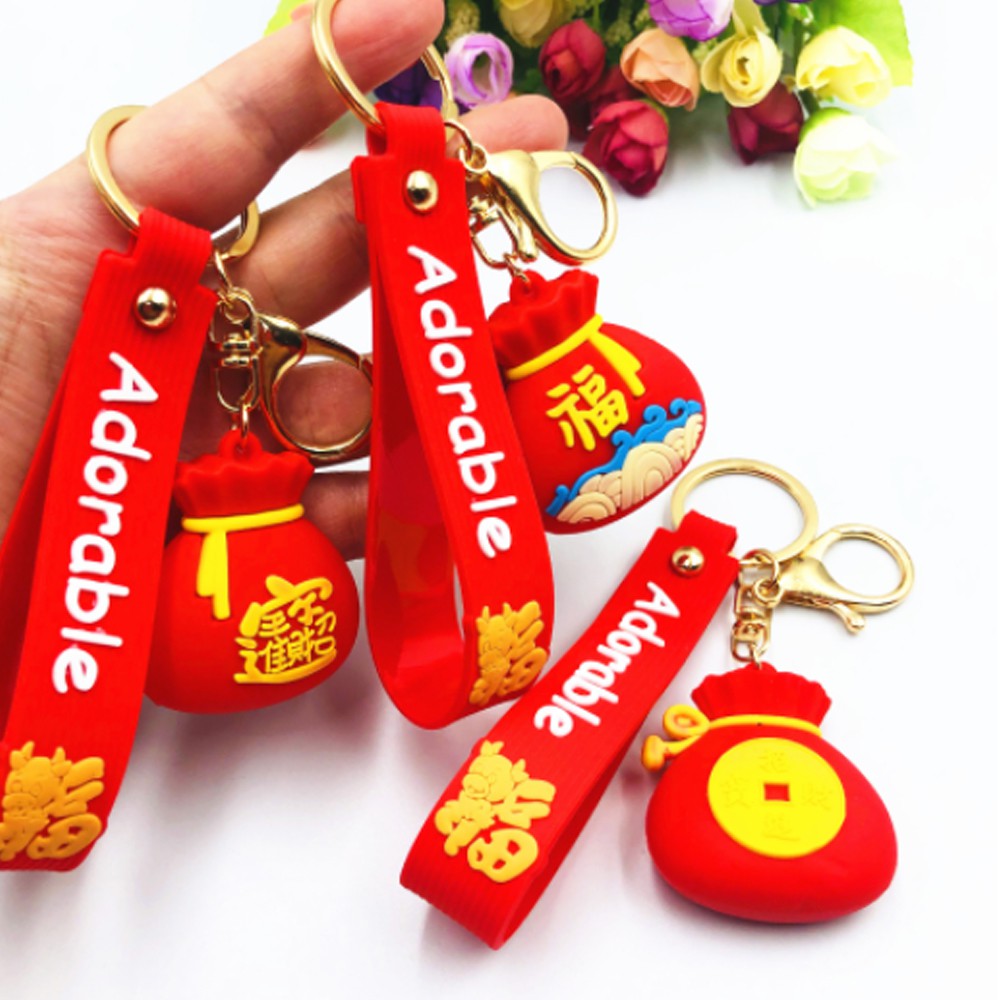 Móc khóa hình túi tiền màu đỏ may mắn