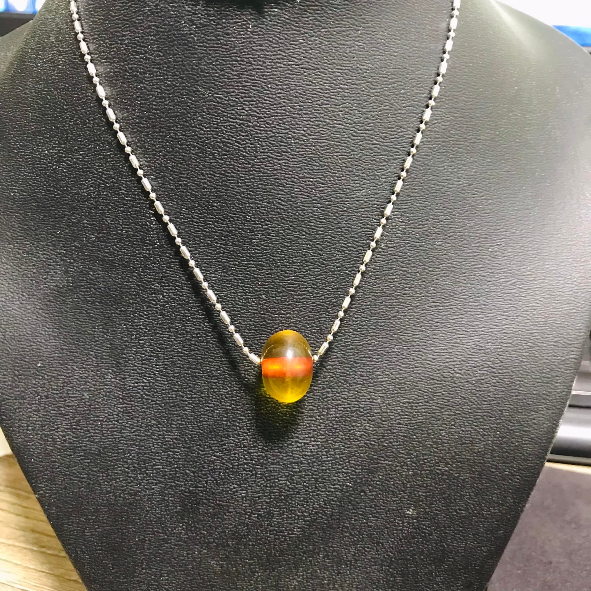 Dây chuyền inox kèm mặt hổ phách 12ly