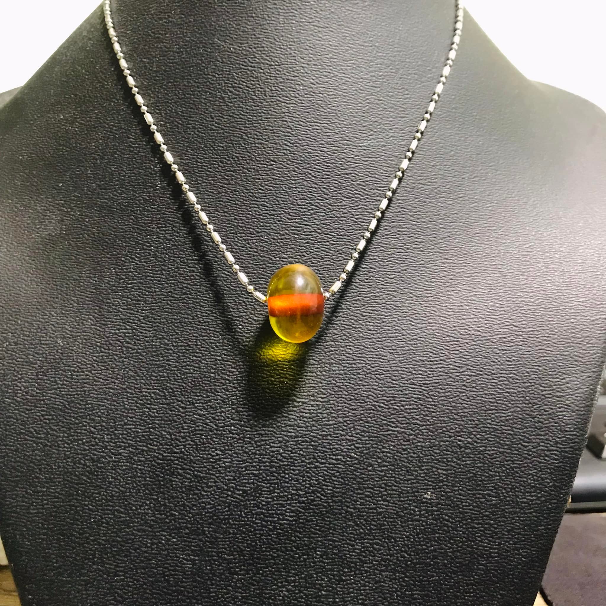 Dây chuyền inox kèm mặt hổ phách 12ly