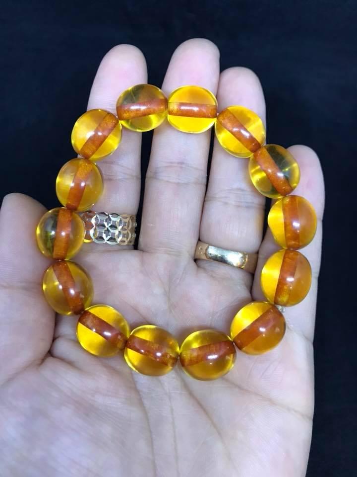 Vòng tay hổ phách vàng hạt tròn 12ly