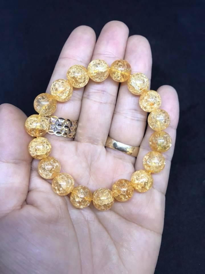 Vòng tay đá tuyết vàng 10ly