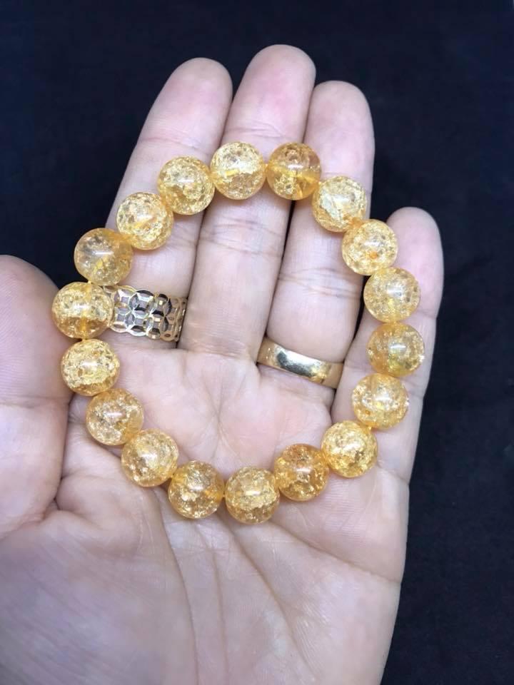 Vòng tay đá tuyết vàng 10ly