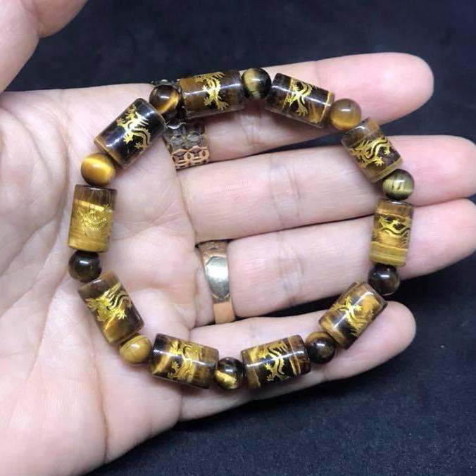 Vòng tay đá mắt hổ chạm rồng 8ly