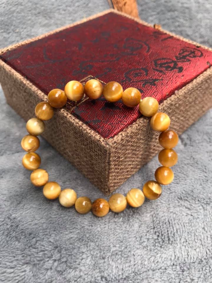 Vòng tay đá mắt hổ tâm vàng - size M
