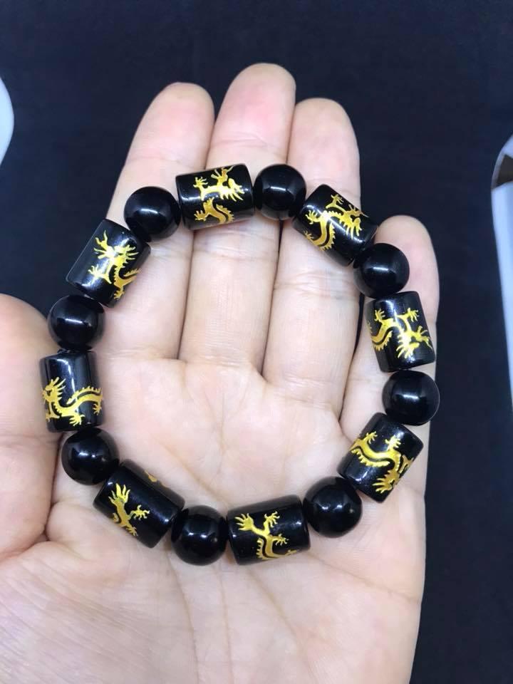 Vòng tay lu thống mã não đen chạm rồng