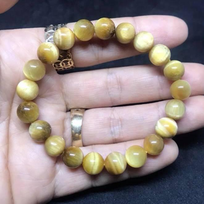 Vòng tay đá mắt hổ tâm vàng tươi 8ly