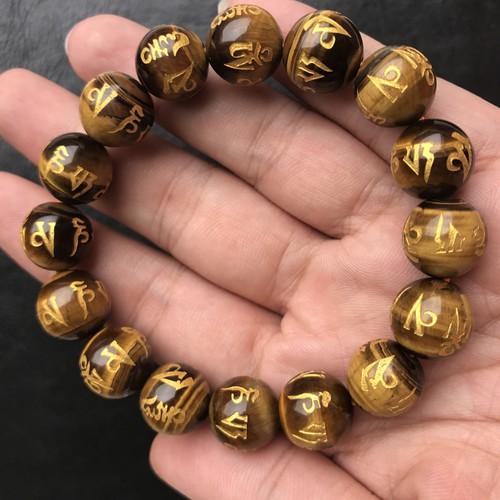 Vòng tay đá mắt hổ khắc Chú Đaị Bi 12MM