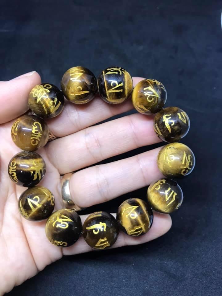 Vòng tay đá mắt hổ khắc Chú Đaị Bi 8MM
